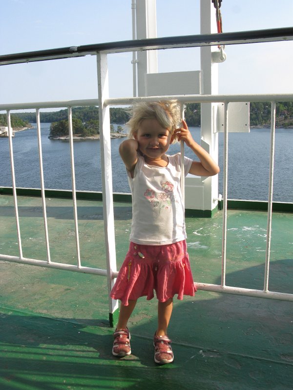 Bennas2010-3668.jpg - Miranda enjoying the view and the breeze on deck.